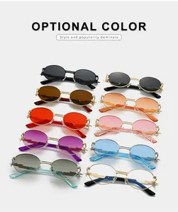 Detail of vintage oval metal sunglasses with unique lightning-shaped temple decorations