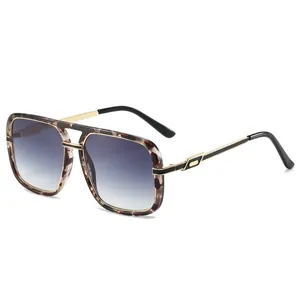 Fashionable oversized square sunglasses with tortoiseshell frames and gradient lenses