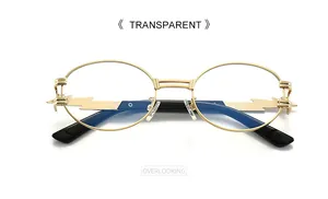 Detail of gold metal oval sunglasses featuring unique lightning bolt temple decoration