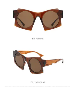 Detail view showing the positive and 45-degree side angles of amber geometric sunglasses