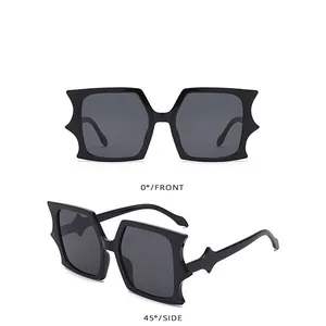 Detailed front and side views of black oversized batwing sunglasses with pointed frames