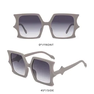 Front and side views of oversized bat-shaped sunglasses with jagged irregular frames
