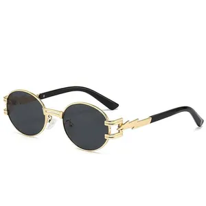 Retro punk oval sunglasses with gold metal frame and unique lightning bolt temple design