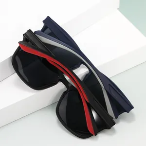 Polarized square frame sunglasses in matte black and dark blue on geometric stands