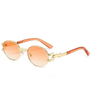 Retro punk oval metal sunglasses with gold lightning temples and orange gradient lenses