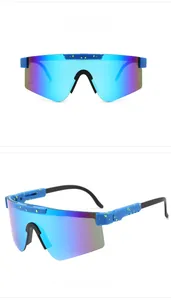 Detail of light blue sports sunglasses with green splatter texture and icy blue lens