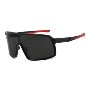Oversized matte black cycling sunglasses with red anti-slip pads and dark grey lens