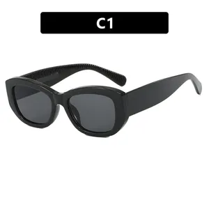 Vintage black thick frame sunglasses with wide ribbed temples and retro design