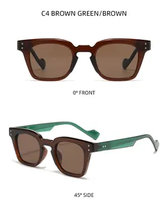 Detail view of square brown green sunglasses with vintage translucent frames and lenses