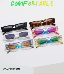 Multiple colorful rectangle sunglasses in black, white, and glitter gradient frames