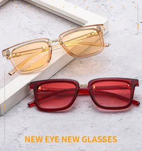 Detail of square oversized sunglasses showing metal bridge and colorful transparent frames