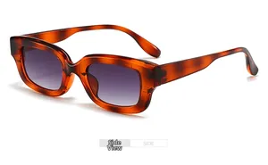 Side view of retro amber tortoiseshell sunglasses with purple gradient lenses and model C33319
