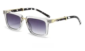 Side view of square sunglasses with gradient lenses and marble textured temples