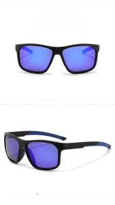 Detail view of sports sunglasses featuring black frames and purple blue gradient lenses