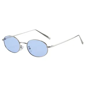 Retro punk style oval sunglasses with silver metal frame and light blue transparent lenses
