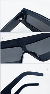 Detailansicht der Metallscharniere und ergonomischen Nasenpads der Oversized-Sonnenbrille