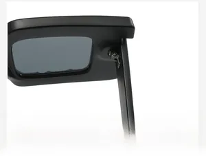 Close-up of matte black sunglasses frame showing the durable metal hinge and temple detail