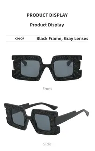 Detail view of black square sunglasses featuring textured frames and dark grey lenses