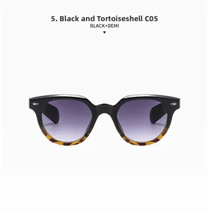 Close-up of retro oval sunglasses featuring black and demi frames with purple gradient lenses