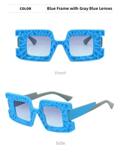 Detail of square oversized sunglasses with blue 3D honeycomb textured frame and gradient lenses