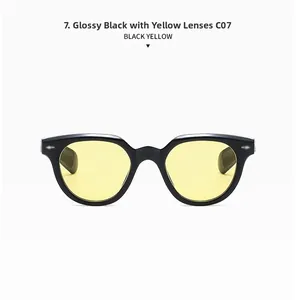 Detail of retro oval sunglasses featuring bright black frames and yellow lenses