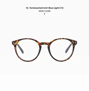 Detail of round tortoiseshell anti-blue light glasses with metal rivets and clear lenses