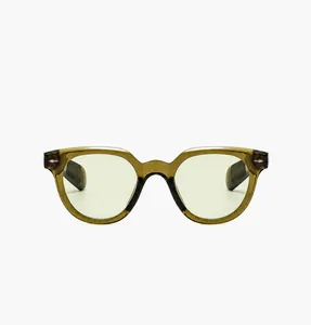 Detailed view of olive green retro sunglasses with classic silver rivet accents