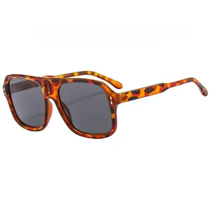 Fashionable oversized square sunglasses with tortoiseshell frames and dark grey lenses