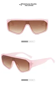 Détails de lunettes de soleil futuristes roses avec verres dégradés marrons