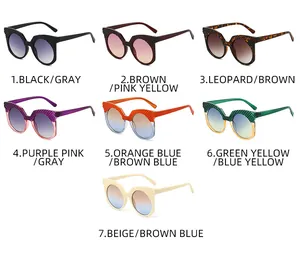 Gros plan de lunettes de soleil rondes en sept coloris avec montures à texture gaufrée