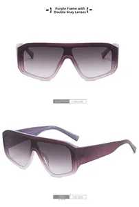Détail des lunettes de soleil futuristes violettes avec des verres dégradés gris