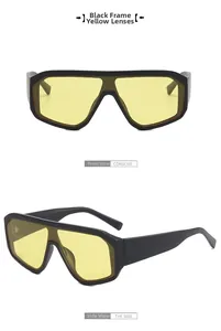 Vues de face et de profil de lunettes de soleil oversize noir mat avec verres jaunes