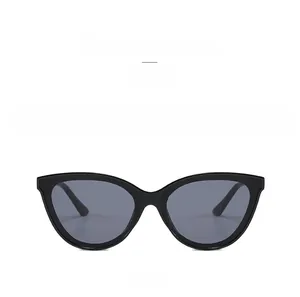 Front view of retro cat eye sunglasses with black frame and grey lenses for women