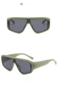 Vue de face et de profil de lunettes de soleil futuristes vert avocat surdimensionnées