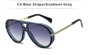 Detail view of double bridge aviator sunglasses with blue stripe frame and gradient grey lenses