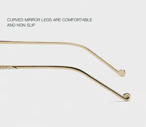 Detail van gouden metalen brilpoten met antislip spiraaluiteinden voor zonnebril