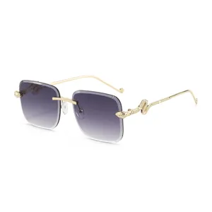 Lunettes de soleil sans monture dégradé violet avec branches serpent en métal doré