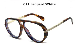Detail of leopard print frames with golden metal temples on aviator style sunglasses