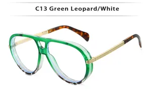 Detail of C13 pilot sunglasses with green leopard gradient frame and gold metal temples