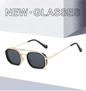 Detail von Vintage-Metall-Sonnenbrille mit Doppelsteg in Gold und Schwarz-Rahmen