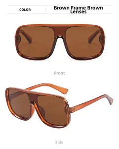 Detail view of tea brown oversized square sunglasses with integrated nose pads and rivets