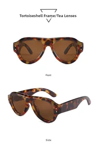 Detailansicht der klobigen Sonnenbrille mit Schildpatt-Rahmen und braunen Gläsern