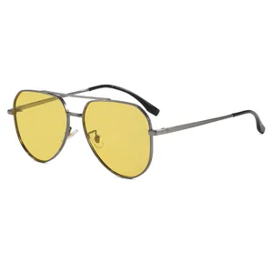 Classic gunmetal aviator sunglasses with yellow photochromic lenses and double bridge