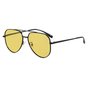 Classic black metal aviator sunglasses with yellow photochromic lenses and double bridge
