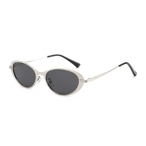 Lunettes de soleil ovales rétro en métal avec monture dorée et verres foncés mixtes
