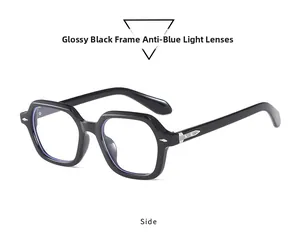 Detail der glänzend schwarzen sechseckigen Brille mit Blaulichtfilter und Nieten