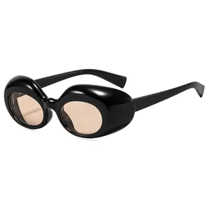 Lunettes de soleil ovales rétro à monture épaisse noir brillant et verres ambrés