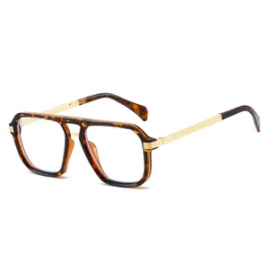 Lunettes de soleil carrées en écaille avec branches dorées et double pont design