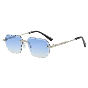 Stijlvolle randloze veelhoekige zonnebril met blauw verloop en diamantgeslepen rand
