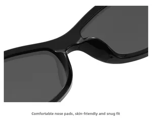 Detail view of the comfortable integrated nose pads on black small frame sunglasses